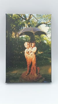 Fotolienzo "Los niños del paraguas" 20x25