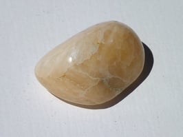 Stilbite pêche en pierres roulées