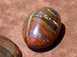 Oeil-de-fer en pierres roulées