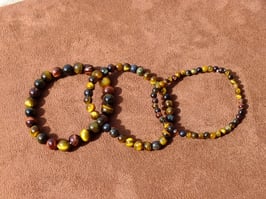 Bracelets en oeil-de-tigre/boeuf/faucon