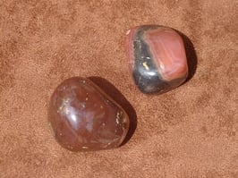 Rhodochrosite foncée en pierres roulées