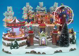 Winterszene Dorf mit Karussell und Riesenrad