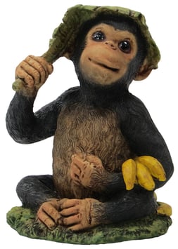 Schimpanse mit Bananen und Hut