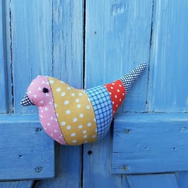 Oiseau jaune rouge bleu rose...