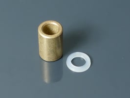 Sintered bronze bushing for idler wheels