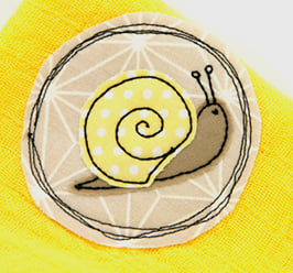 Nuscheli Schnecke gelb