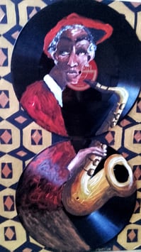 Saxophoniste aux vinyles