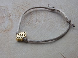 PATTA Armband Glücksknoten Anhänger gold