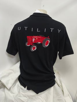 Polo noir brodé utility