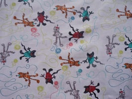 Cats playing with wool