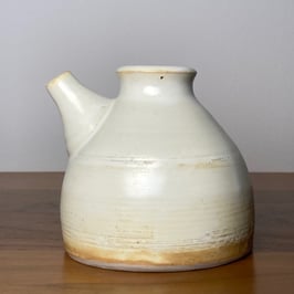 small pale yellow pourer