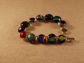 Glass bracelet.  This is for sale now, check it out on the store page.
