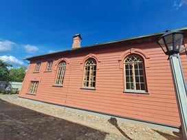 Brown timber synagogue in Ludza, Latvia