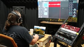 Jeffrey Jousan at the recording desk. Nice Neve, Red 6 and Grace Designs pre-amps on the rack.
