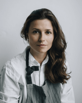 Young woman in pinny portrait 