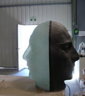 Cabeza  (doble) de Jano, vidrio y bronce