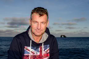 Jonathan R. Green in Darwin Arch, Galapagos