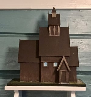 tremodell av stavkirken etter tegning fra 1855