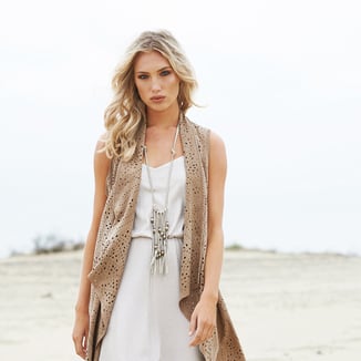 LONG SUEDE SLEEVELESS VEST WITH EMBROIDERIES AND PERFORATIONS