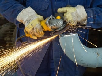 Laut DIHK trägt der Mindestlohn zur Verunsicherung bei, weil er zu höheren Lohnkosten führe. Foto: Patrick Pleul