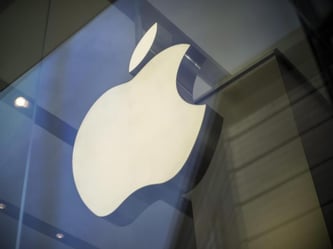 Apple Logo in einem Computer-Laden. Foto: Adrian Bradshaw/Illustration