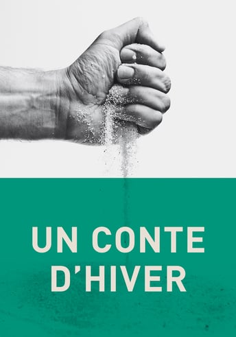 Le poing fermé d'un homme laissant s'égrainer du sable