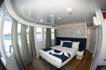 Main Deck Cabin with double bed on board the vessel Galaxy Diver II - Galapagos Shark Diving