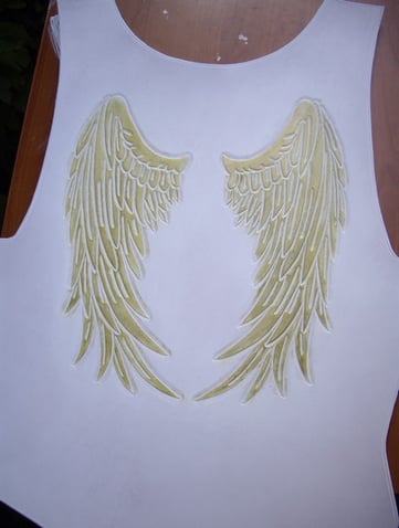 Plastron de spectacle - dos avec ailes dorées