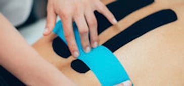Taping Basel, Tapeverbände Basel, Kinesiotape, Physiotherapie Basel, Sportverletzung, Sportler, Selbstheilung, Physiotherapeut Basel, Massage Basel