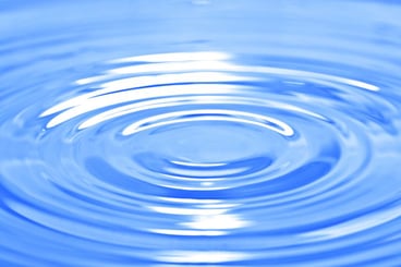 ripples on blue water - Spiritual Life Coaching