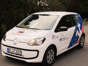 Fahrzeugbeschriftung des Ameisenmobils: Entworfen und gesetzt von Astrid Röben Printmedien in Neuenkirchen.