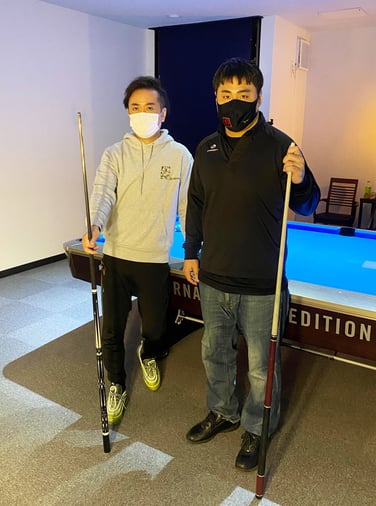 湯山功プロ（PWO代表。左）と中野雅之アマ（右）