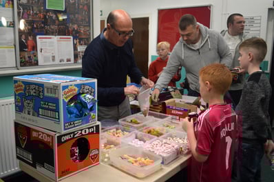 Photo of one of our volunteers helping out at rehearsals.