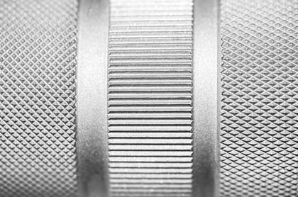 Cross-hatched, herringbone and straight knurling with the same knurling rollers