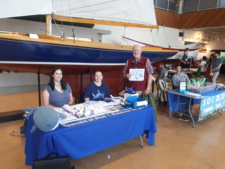 Peter Wells, IOI Canada SRF and Chair of the Bay of Fundy Ecosystem Partnership, with flyer in-hand at the federal Department of Fisheries and Oceans “Species at Risk” display.