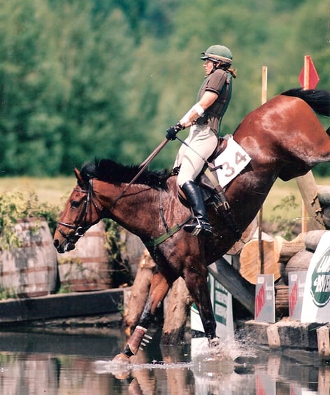 Event horse jumping into water