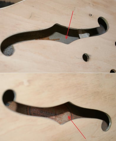 Die F-Holes werden mit einer Ziehklinge die zurechtgemacht wurde, zumindest im Sichtbereich von dem Goldlack befreit.  Leider ist ein Arbeiten durch die engen F-Holes ein sehr großer Zeitaufwand.