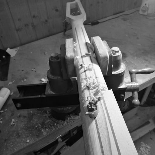 shaping a bass neck with slotted headstock - stay tuned to see this amazing bassguitar finished