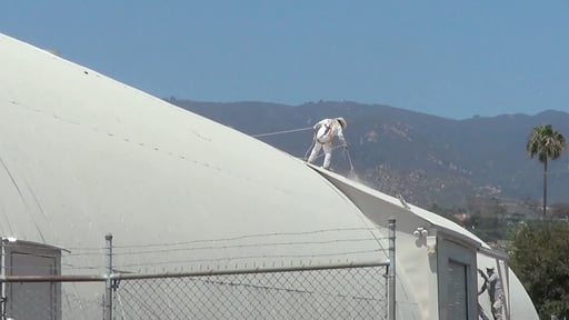 Spraying Ceramic InsulCoat Roof on a Metal Quonset Hut