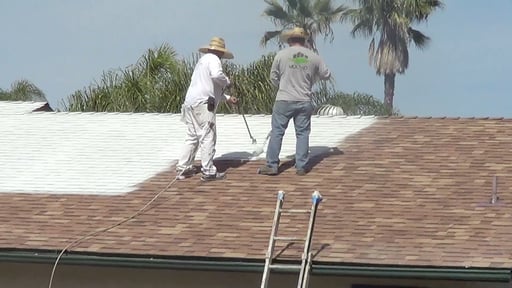 Application of the first coat of Ceramic InsulCoat Roof tinted to a light gray on a Residential Asphalt Shake Roof