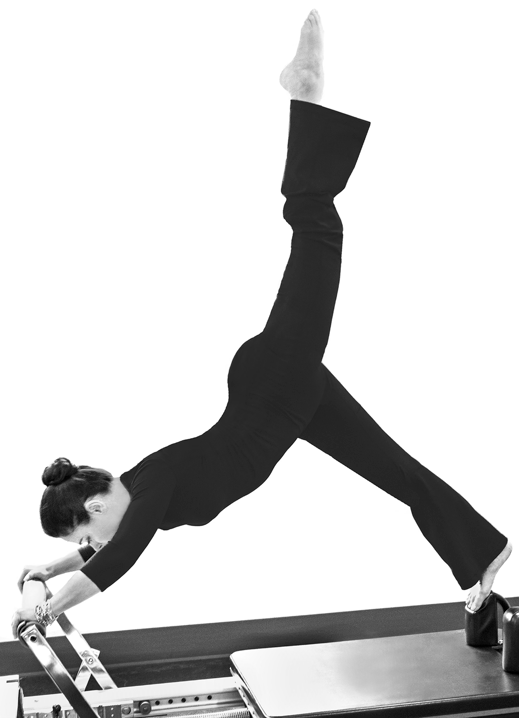 STUDIO ORIGIN’s owner, Renata, defying age and health stereotypes performing the advanced Pilates Arabesque with ease.