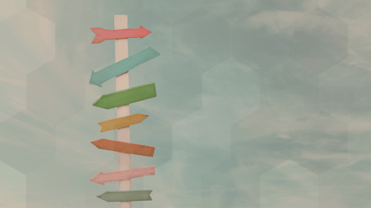 Bunte Richtungsweiser als Metapher für den Systempunkt – Wendepunkte und neue Perspektiven