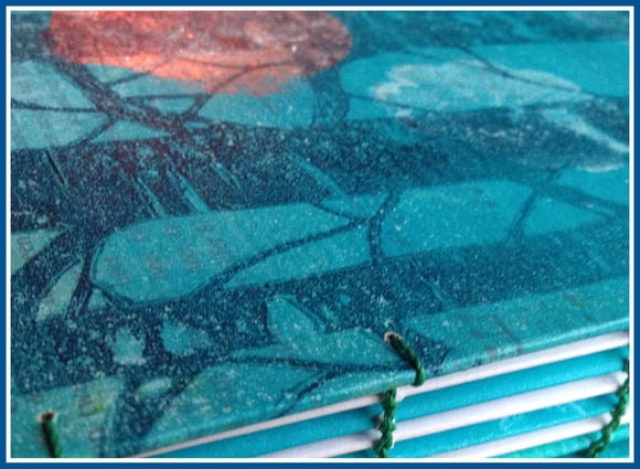 handmade book, gelliprinted covers, trees, moon, coptic binding