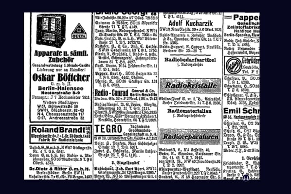 "Radio-Conrad" im Berliner Adressbuch von 1935 mit der letzten Adresse "Berliner Straße 92". Im Krieg wurde das Gebäude zerstört. Heute befindet sich hier ein Neubau.