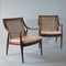 Armchairs design Peter Hvidt & Orla Mølgaard-Nielsen for France & Son. Frame in teak with back in braided rattan and seat in aniline full-grain natural leather from Elmo. H.82cm.