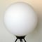 Bordslampa Italiensk design, stilnovo-era, 1950-tal. Glob i matterat opalglas, fot i lackerad metall med mässings detaljer. H. ca 63cm.