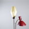 Golvlampa design Hans Bergström för Atelje lyktan, 1950-tal. lackerad metall med detaljer i mässing. H.152cm.