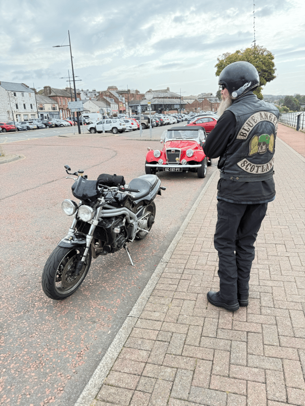 Spartan car with a biker