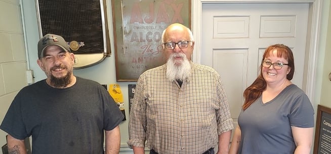 Mike with Noel and Bonnie Bowes, new owners of Rochester Radiator