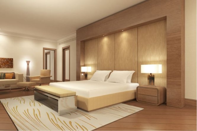 bruine slaapkamer inrichten met wandkast